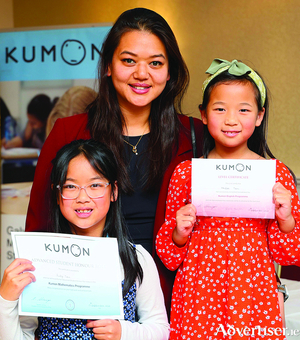 Rebecca Lau of Ranmore with her daughters Chloe and Ruby at the Kumon Galway City West 10th Anniversary celebration and awards ceremony in the Menlo Park Hotel on Sunday. Photo: Mike Shaughnessy