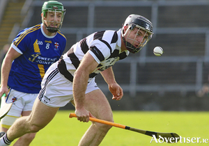 On the attack:Barry McDonagh of Turloughmore is chased by Loughrea&#039;s Ian Hanrahan in the Brooks Galway Hurling Senior Club Championships semi-final at Pearse Stadium on Sunday. Photo: Mike Shaughnessy