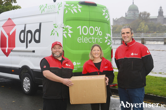 Matty and Jennifer Heneghan, DPD Galway city depot owner’s with Stephen Tummon, Sustainability Programme Manager at DPD Ireland with one of their electric delivery vans. Photo: Mike Shaughnessy 