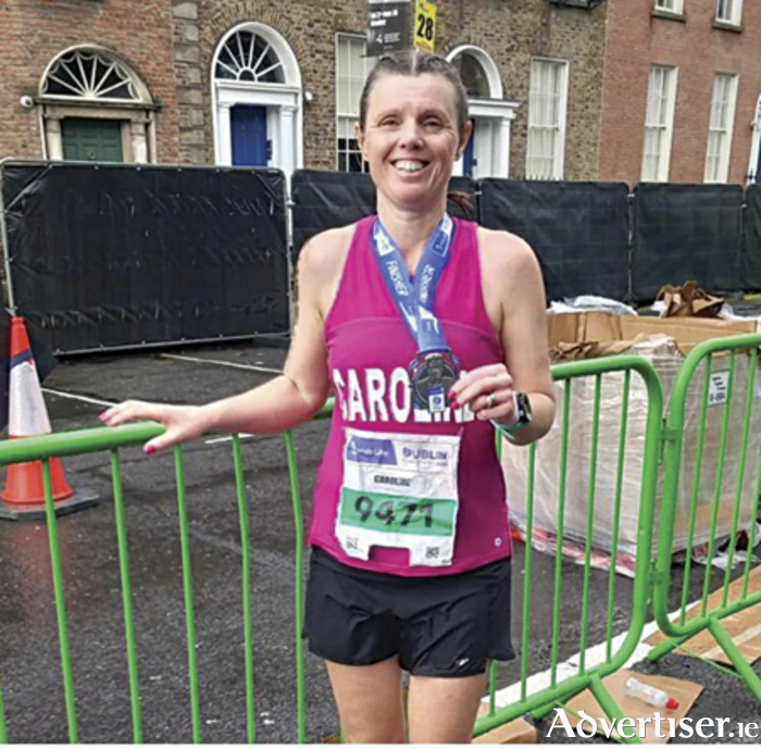 Athlone Athletics Club member, Caroline Devlin, is pictured in jovial spirits having achieved a PB run at the Dublin City Marathon