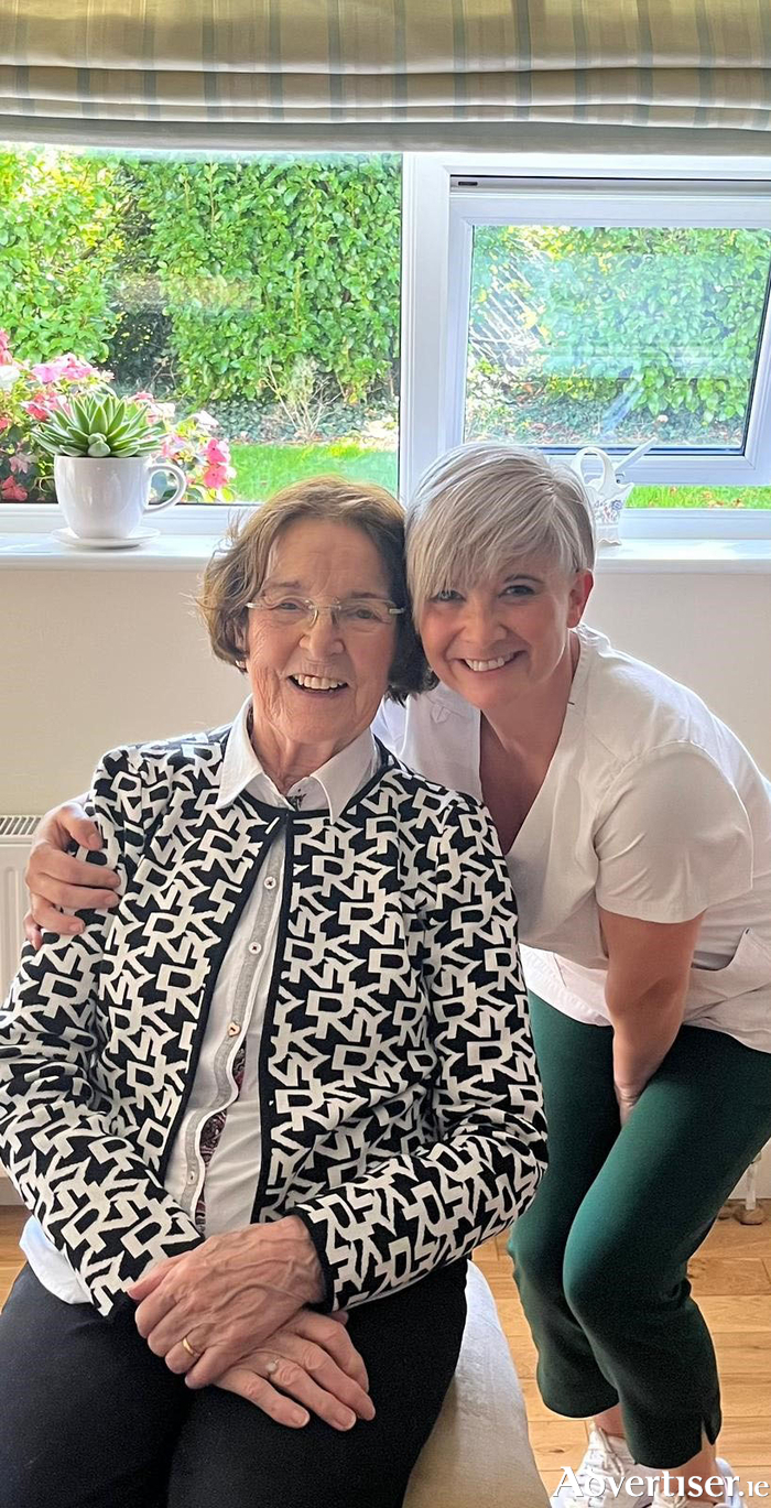 Patient Kathleen O’Sullivan in her home in Galway with GUH Frailty Team’s Therapy Assistant, Patricia Duffy.