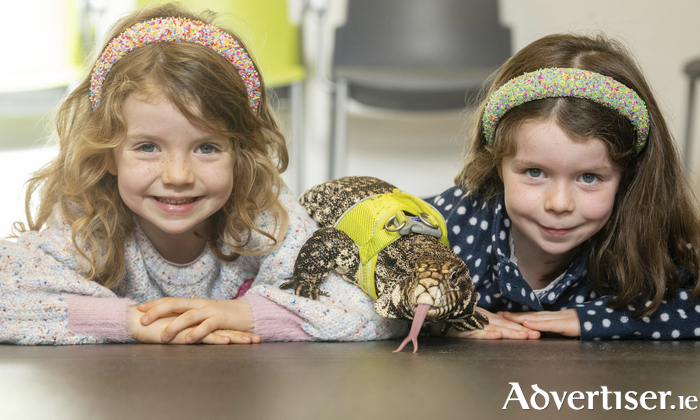 Pictured at the Galway Science and Technology Festivals annual Exhibition Day on the University of Galway campus was an Argentinian black and white Tegu called Kenge who entertained sisters Alice, 5 and Kate (7) Pierse, from Shantalla, Galway Photo:Andrew Downes, xposure,