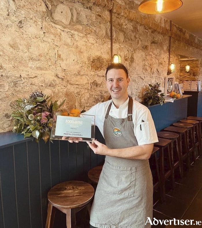 Blackrock Cottage executive head chef, Martin O'Donnell, is pictured with his Best Chef in Connacht award from the Food & Wine Restaurant of the Year awards. 