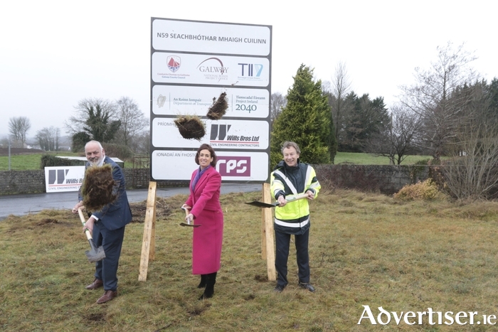 Minister Hildegarde Naughton, Cllr. Peter Keaveney (left) Cathaoirleach of Galway County Council and Peter Walsh, Transport Infrastructure Ireland turning the sod on the Moycullen Bypass in January 2022.