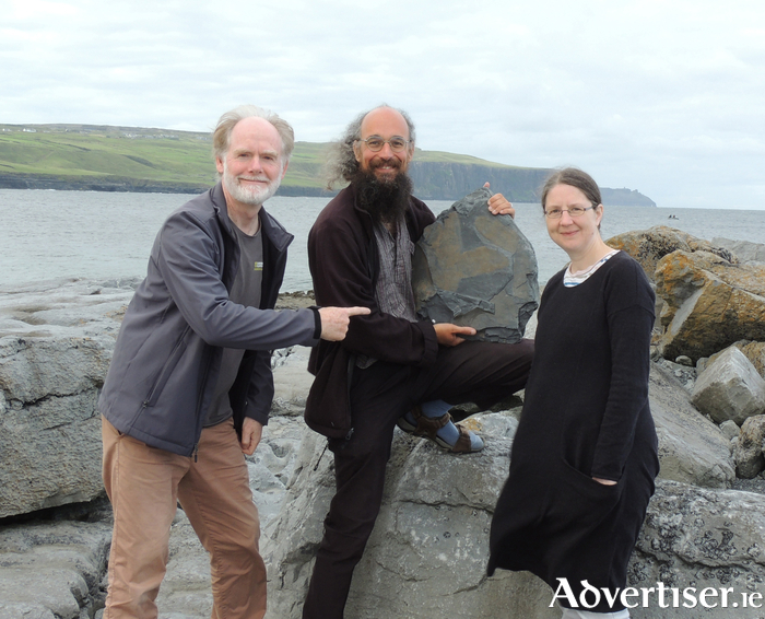 Dr. Eamon Doyle (right), Dr. Joseph Botting (centre) and Dr. Lucy Muir (right) with the new fossil sponges discovered near the Cliffs of Moher in County Clare. 