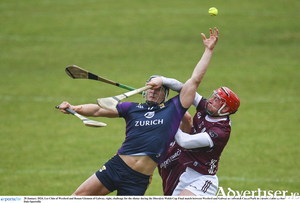 Lee Chin of Wexford and Ronan Glennon of Galway, right, challenge for the sliotar during the Dioralyte Walsh Cup Final match between Wexford and Galway at Netwatch Cullen Park in Carlow. Photo by Seb Daly/Sportsfile