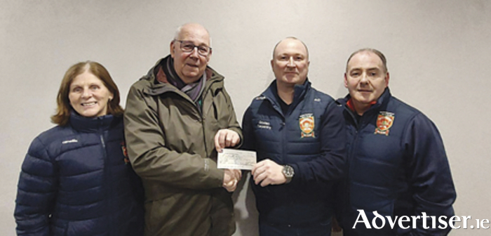 Pictured at a recent presentation of funds raised by the annual Derek Daly memorial 5k walk/run held by Garrycastle GAA Club on St Stephen’s day to the South Westmeath Hospice were, l-r, Trish Dolan chairperson Garrycastle GAA Club, Joe Whelan, Westmeath Hospice, Alan Daly and David McGovern, Garrycastle GAA Club.