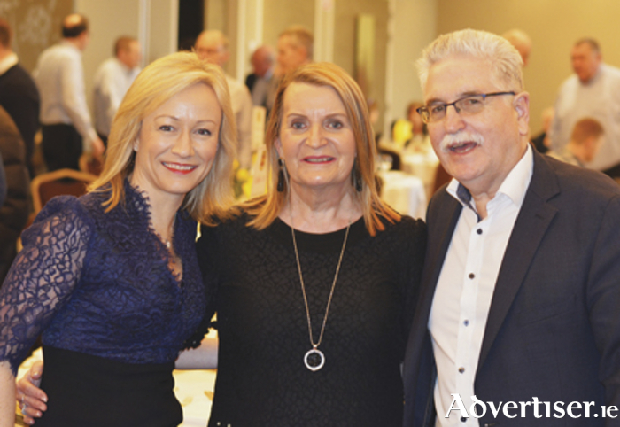 Guest speaker Julie Ennis, CEO, Sodexo is pictured with Regina and Ronan Bushell at the recent Buccaneers RFC business networking lunch in the Sheraton Hotel Athlone
