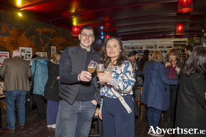 Galway Hooker&#039;s Michael Fitzgerald and artist Cathy Hughes. 