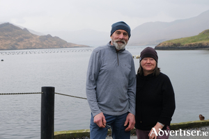 Simon Kennedy and his wife Kate O&#039;Connor Kennedy, the team behind Killary Fjord Shellfish with the magnificent backdrop of Killary Harbour 
