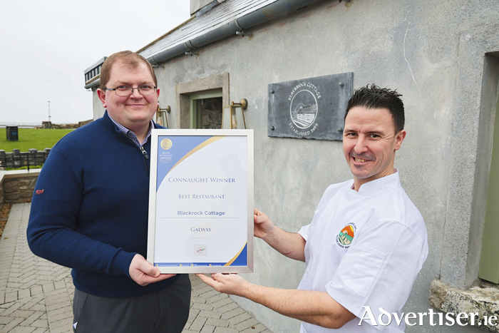 Mathieu Teulier, general manager and Martin O'Donnell, executive head chef at Blackrock Cottage in Salthill with their latest Irish Restaurant Award. Photo: Mike Shaughnessy.
