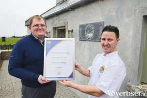Mathieu Teulier, general manager and Martin O&#039;Donnell, executive head chef at Blackrock Cottage in Salthill with their latest Irish Restaurant Award. Photo: Mike Shaughnessy.