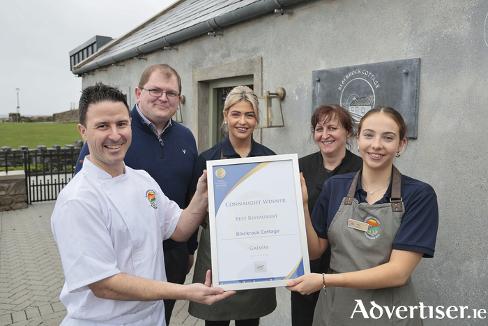Martin O'Donnell, executive head chef at Blackrock Cottage in Salthill, is pictured with Mathieu Teulier, general manager, Eimear Ní Thuairisg, Helena Maltaric and Alice Kilfeather with their latest Irish Restaurant Award. Photo: Mike Shaughnessy.