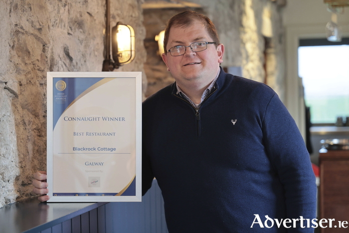 Mathieu Teulier, General Manager at Salthill's Blackrock Cottage, pictured with 'Best Restaurant in Galway' award. (Photo: Mike Shaughnessy)