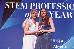 STEM PROFESSIONAL of the Year, Karen May, Company Director and Chief Financial Officer of XOCEAN Ltd, receives her award from Anne McEvoy, Pinergy, at the IMAGE PwC Business Woman of the Year 2024 awards ceremony
