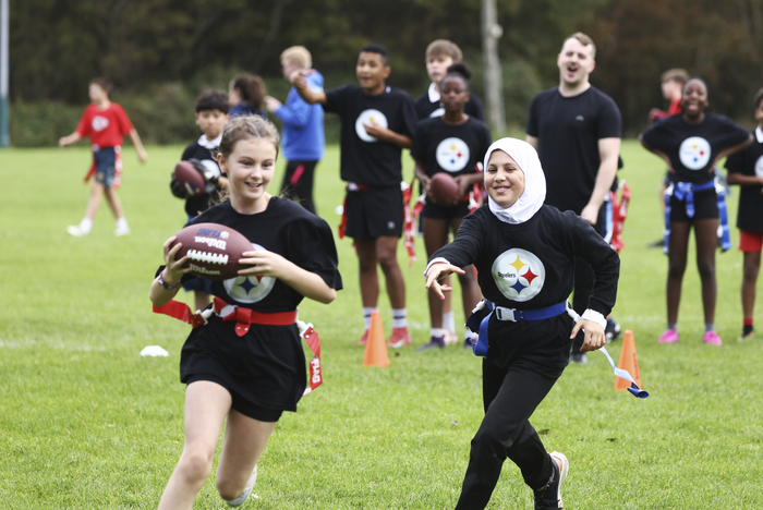 Pupils from Mercy Primary School at the NFL Flag in Galway, Ireland, Friday, September 19. (Peter Morrison/AP Content Services for the NFL)