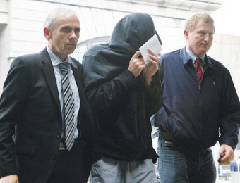 Jakub Fidler (centre)  pictured entering Galway courthouse on Tuesday afternoon. Photo: Mike Shaughnessy