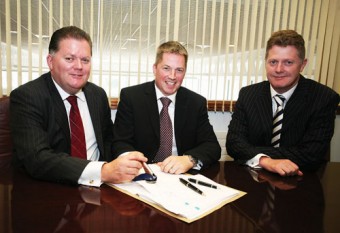 From left to right: David Hogan, chairman Tom Hogan Motors, John Lawlor, BMW network strategy manager and Paul Hogan (FCA), director Tom Hogan Motors, signing the official contract to become the newly appointed BMW & MINI dealer for Galway.

