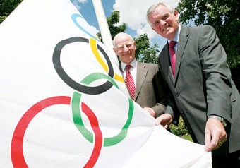 Pictured raising the Olympic flag at their headquarters in Dublin is Olympic Council of Ireland president Pat Hickey (left) with Volkswagen chief executive Bob O’Callaghan.