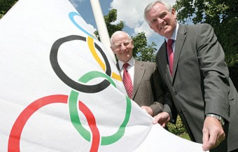 Pictured raising the Olympic flag at their headquarters in Dublin is Olympic Council of Ireland president Pat Hickey (right) with Volkswagen chief executive Bob O’Callaghan.