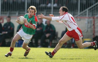 Catch me if you can: Conor Mortimer shakes off the challenge of Brian Dooher in a league clash between Mayo and Tyrone, both will be key men for their counties tomorrow. Photo: Sportsfile. 