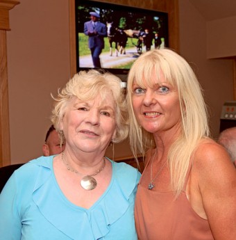 At the official reopening of the Quiet Man Pub in Cong Co from left: Bridget Mullan, Belfast pictured with Norah Fagan who was involved in fitting out the premises. John Wayne is pictured in the background. Photo: Michael Donnelly.