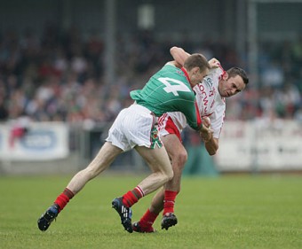 Rough and tumble: John Broderick and Kyle Coney get to grips with each other. 
Photo: Sportsfile