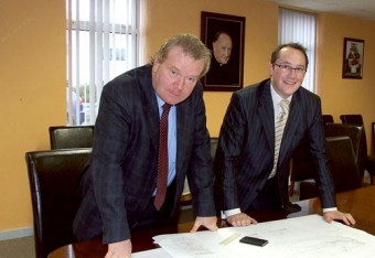 Pictured (left to right) at Ireland West Airport Knock reviewing the plans of the CAT II ILS & Runway Improvement projects  are Michael O’Brien, contracts director, McNamara & Co with Tomás Grimes, property manager, Ireland West Airport Knock and grand nephew of the late Monsignor Horan.