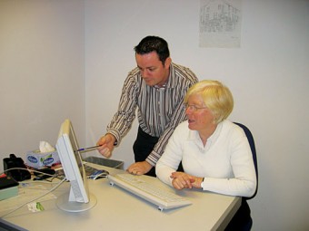 Evergreen’s James Higgins and Aideen Hurley checking out their website which has just been shortlisted for a Golden Spider award.