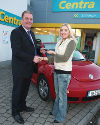 John Raftery, owner of Centra, Claremorris, was delighted to present Ruth Kilgallon, Ballaghaderreen with the keys of a brand new Volkswagen Beetle abriolet that she won in his store.