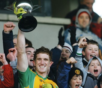 Kieran Fitzgerald, captain of Corofin, lifts the Shane McGettigan Cup after his team defeated Eastern Harps in the AIB Connacht Club Senior Football Championship final at Pearse Stadium.
   Photo:-Mike Shaughnessy