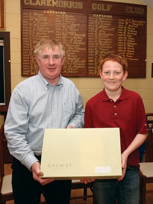 John F Concannon (outgoing captain Claremorris Golf Club) presents first prize in the recent Robert Blacoe Jewellers sponsored competition to Shane McGagh. Photo: © Michael Donnelly.
