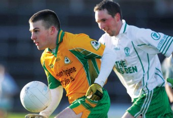 Ready for the next step: Joe Canney of Corofin in action against Shane King of Eastern Harps in the Connacht Senior Club Football Championship.