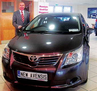 Tony Burke, dealer principal at Tom Hogan Motors, Ballybrit, with the new Toyota Avensis. Both the new iQ minicar and new Avensis are now showing in the showrooms at Ballybrit.