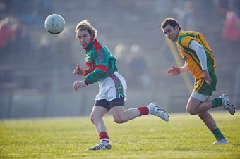 Eyes on the ball: Conor Mortimer and Donegal's Karl Lacy get ready to fight for the ball in last years league meeting between the two sides. Photo: Sportsfile