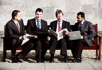 An effort to understand the ëboom and bustí cycles of financial markets has seen the launch of a virtual stock market experiment at NUI Galway.  Pictured at the launch of the exchange are (left to right) NUI Galwayís Dr Laurentiu Vasiliu, Daniel Paraschiv, President James J. Browne and Dr Srinivas Raghavendra.  