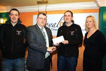 Engines ready: Pat Jennings of the TF Royal Hotel and Theatre presenting a sponsorship cheque to Clerk of the Course of the Mayo Stages Rally, Jonathan Rice. Also in photo are Billy Evans (Deputy Clerk of the Course) and Hilary Evans (Event Secretary).