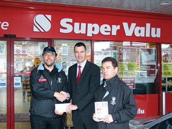 Alan Deegan and John Shaughnessy of Galwegians are presented with a sponsorship cheque from George Osbourne of Nestor’s SuperValu for Galwegians Youth Academy.
