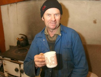East Galway farmer Mickey Morgan enjoying a hot cup of tea at his flood stranded home. Picture: Hany Marzouk	