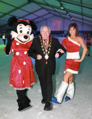 At the opening of Galway Bay on Ice at Nimmo's Pier on Monday night were Mayor Declan McDonnell with Mini Mouse and Deirdre Fitzpatrick of Salthill. Photo:-Mike Shaughnessy
