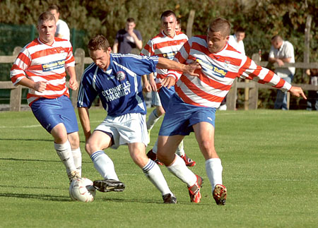 Swinford's Gordon Carter, (centre), was star of the show in his club's semi-final defeat of Moy Villa (pictured above) which secured them their place in the Chadwick's Cup Final against Manulla next Sunday. The winger came off the bench to score a vital second half goal. Photo: David Farrell Photography.