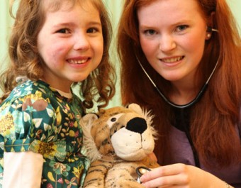 Four-year-old Hannah Baumann was at NUI Galway as details of the fifth annual Teddy Bear Hospital were announced this week. The event is to take place at NUI Galway from 28-29 January, when some 1,000 sick teddy bears will be admitted to the hospital, accompanied by their owners, 1,000 primary school children between the ages of three and eight. Hannah is pictured here with NUI Galway medical student Sharon Cowley from Rathlee, Co Sligo.
Photograph by Aengus McMahon