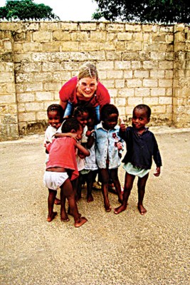 Elaine with some of the happy children.