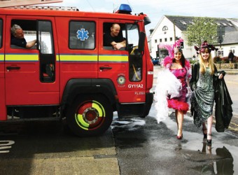 Things are hotting up nicely at GTI Fashion. In flamboyant outfits from The Studio costume hire, Spiddal, Emma Nestor and Bridget Madden attract the attention of firemen before a photocall for GTI Fashion Fiesta — a fusion of fashion and fun throughout Galway from Mon May 10 to Fri May 14 inclusive. All events throughout the week are free and everyone is welcome to go along. 
All proceeds will go to Cancer Care West. 

For full programme details see www.gti.ie. 

Photo:-Mike Shaughnessy