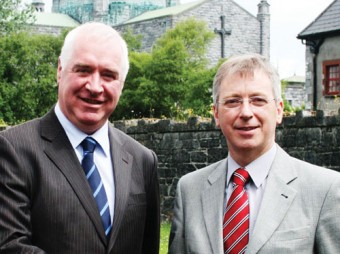 Pictured right: Myles Mc Hugh, St Joseph's College board of management congratulates Ciaran Doyle on his appointment as principal of the Bish.