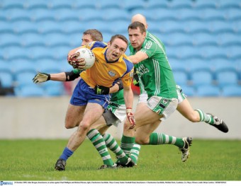 Breakout: John Brogan (Knockmore) breaks away from a number of Charlestown players. Both sides will be looking to cement their places in the last eight of the club championship this weekend. Photo: Sportsfile.