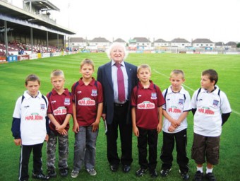 Dep Michael D Higgins with some of the Chernobyl children who visited Galway this year, at the Galway United v Dundalk match on July 25. GUFC kindly had them as mascots at the game.