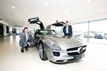 Niall Cunningham and Joe Higgins with the Mercedes SLS AMG in their Briarhill Showroom
