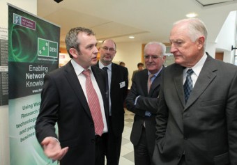 Marc Mellotte from NUI Galway’s DERI demonstrates what DERI does during former CEO and chairman of Intel Dr Craig Barrett’s visit to NUI Galway for the ‘Education for Innovation’ address while NUI Galway deputy president Professor Jim Ward and DERI CEO Michael Turley look on.