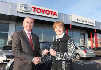 Tony Burke of Tony Burke Motors, in Ballybrit, Co Galway, with Siobhan Murphy from Salthill in Galway, the 500,000th buyer of a Toyota vehicle in Ireland.
